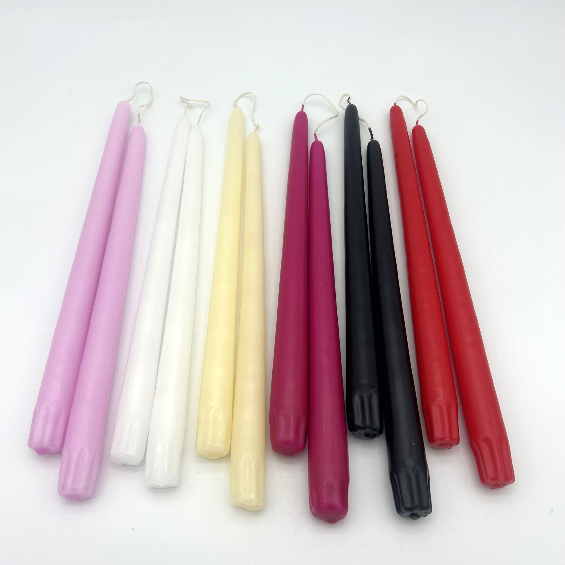 Set of colorful candles on a white background